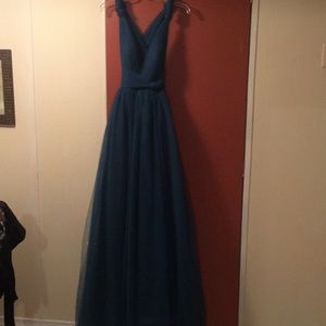 Emerald green evening gown. Tule over satin.